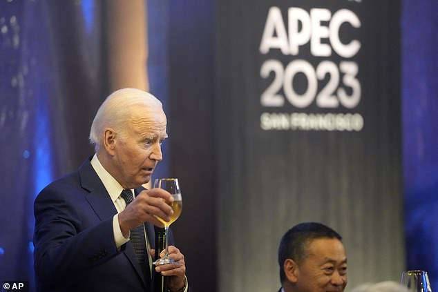 President Joe Biden offers a toast at a dinner for the Asia-Pacific Economic Cooperation Summit