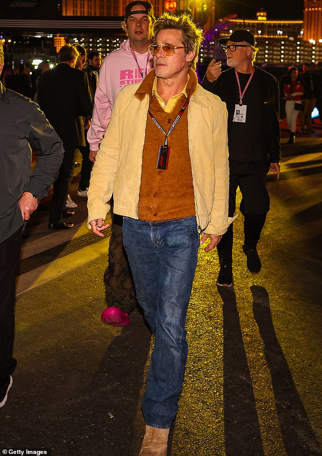 Icon: Brad Pitt arrived at the F1 Grand Prix in Las Vegas on Saturday looking like he stepped off the set of one of his most iconic films from 25 years ago