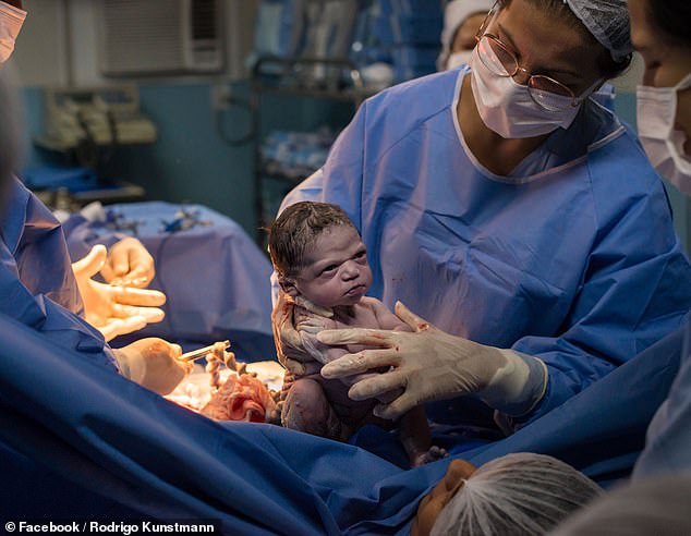 In a photo of Isabela Rocha taken shortly after her birth, she doesn't look very impressed