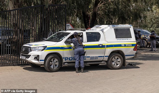 The 63-year-old man, who has not been named, is accused of being part of a gang of sexual predators who preyed on young children and forced them to make porn (file image from South African Police in Springs)