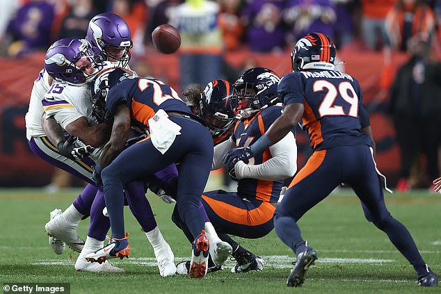 Josh Dobbs fumbles after being hit by the crown of Kareem Jackson's helmet on Sunday