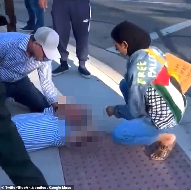 A Palestinian supporter appears to help Kessler after he clashed with other protesters