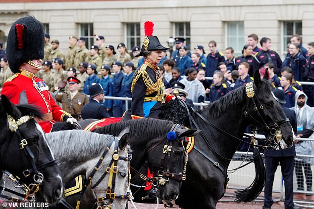 The Princess Royal (centre) held the position of Gold Stick-in-Waiting and led the King's Household Cavalry troopers of the Blues and Royals and Life Guards on horseback during the coronation in May