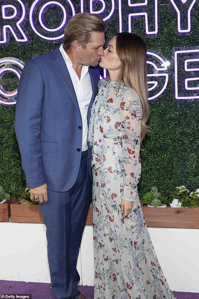 Australian chef Curtis Stone, 47, (left) and wife Lindsay Price, 46, (right) showed off their affection Saturday at the 2023 Breeders' Cup World Championships in Arcadia, California