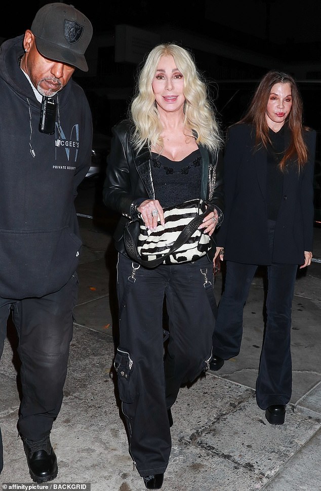 In town: Cher rocked a platinum blonde hairstyle as she headed out to dinner with some friends in West Hollywood