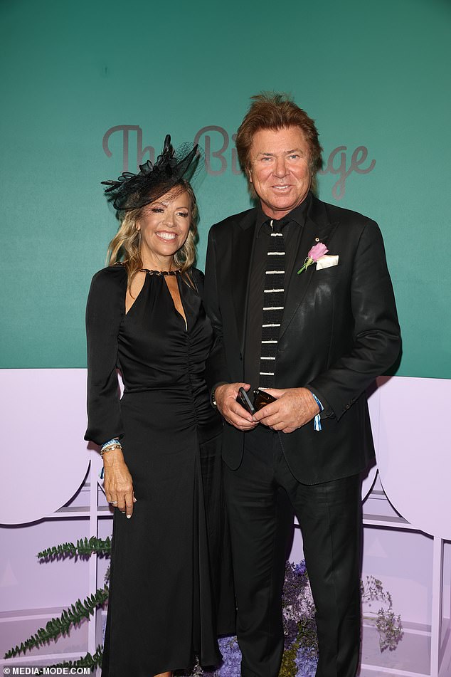 Christian's famous dad Richard Wilkins, 69, and his girlfriend Nicola Dale are pictured