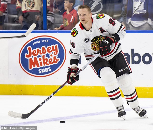 The Chicago Blackhawks are waiving and terminating Corey Perry's contract