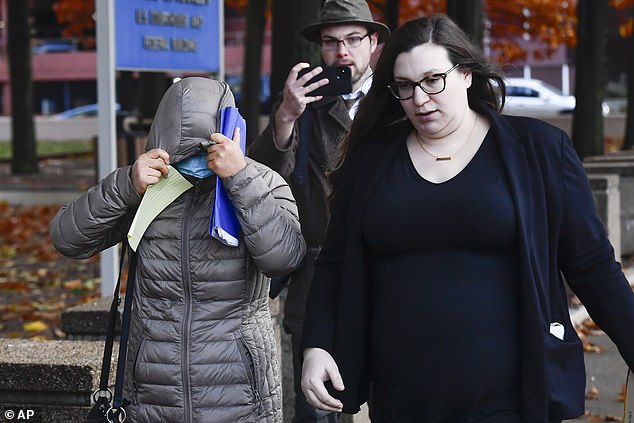 Patrick Dai's mother (pictured left) leaves the US court with her son's lawyer, Gabrielle DiBella