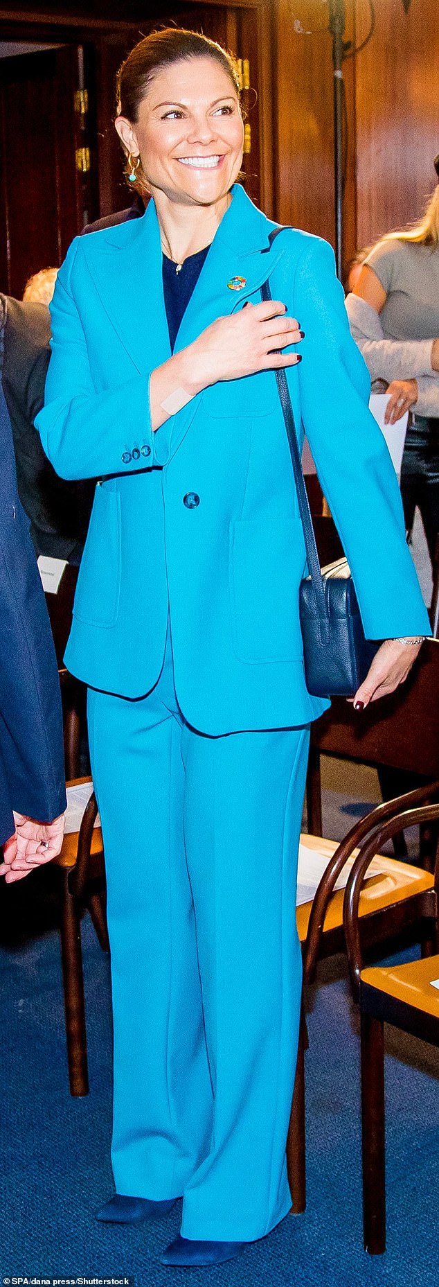 Crown Princess Victoria of Sweden (photo) stunned today in all-blue attire during a seminar in Stockholm