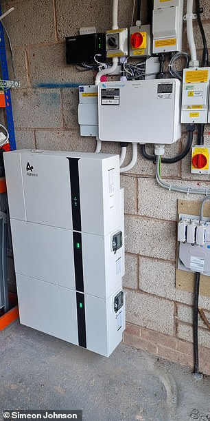 Powerful: Simeon installed this battery in his garage to save money on his daytime electric bill by paying cheaper nighttime rates