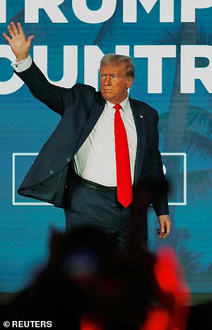 Former President Trump dons his signature red tie