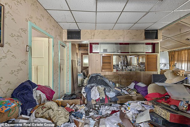 The house was sold in a seriously unkempt condition, with clothing and other items covering the surfaces