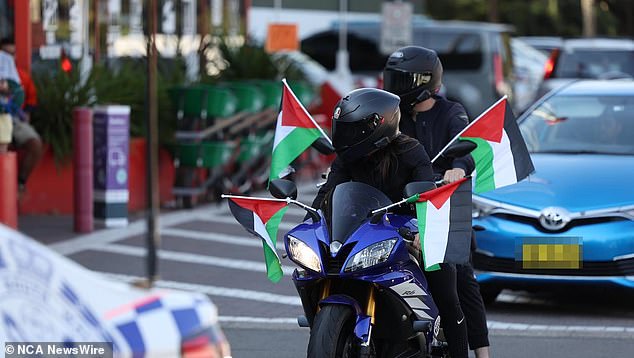 About a dozen riders (pictured) from the Al Quds community center in Regents Park, in Sydney's west, rode from Lidcombe to Coogee on Saturday evening