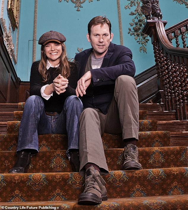 Charles Courtenay, 19th Earl of Devon and member of the House of Lords, pictured with his wife, AJ Langer, at Powderham Castle in 2016