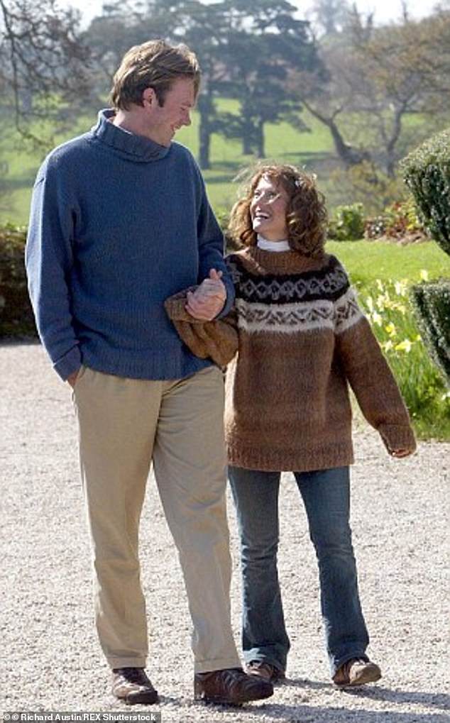 The couple, pictured here at Powderham Castle, have split after 18 years, citing 'irreconcilable differences'