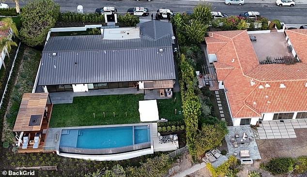 Aerial photos show Perry's pool and hot tub at his $6 million Pacific Palisades home, where he was found dead late last month at age 54.