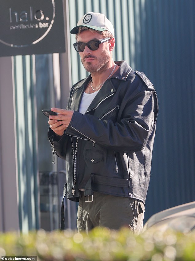 Split: Newly single Chris Appleton looked somber as he stepped out without his wedding ring for the first time since his divorce from Lukas Gage