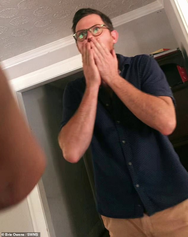 This is the emotional moment a woman told her husband they were expecting a baby after the couple had been trying for 15 years.  (Image: The woman's husband, Stephen Owens, hears the news)