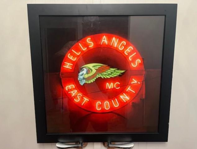 Former Hells Angels biker Dayne Brajkovich sells his gang merchandise on Gumtree (pictured, a neon sign for sale)