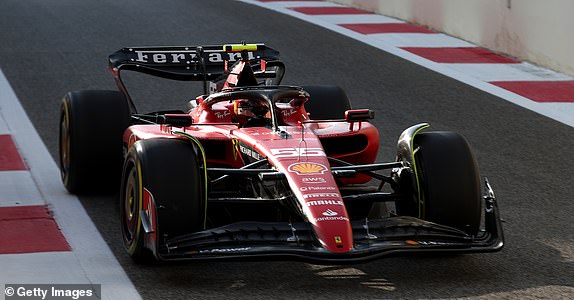 ABU DHABI, UNITED ARAB EMIRATES - NOVEMBER 25: Carlos Sainz of Spain driving (55) the Ferrari SF-23 in the Pitlane during the final practice ahead of the Abu Dhabi F1 Grand Prix at Yas Marina Circuit on November 25, 2023 in Abu Dhabi, United Arab Emirates.  (Photo by Peter Fox/Getty Images)