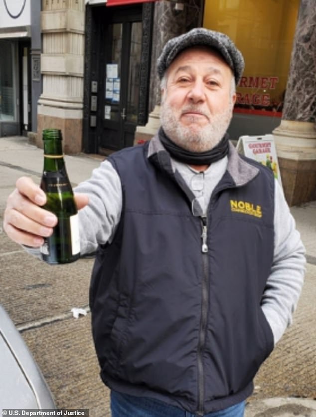 Francesco Vicari, 46 – known as “Uncle Ciccio” – is pictured in a detention memo cheering with a bottle of champagne after successfully getting a victim to make a $4,000 payment in one of the country's alleged violent extortion schemes crime family