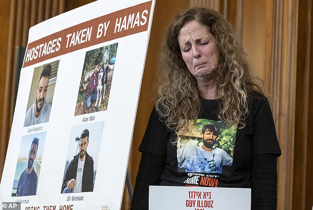 Doris Liber bursts into tears when she tells how her 26-year-old son Guy Illouz (photo on the T-shirt) was taken hostage by Hamas.  She called on the US to step up its aid