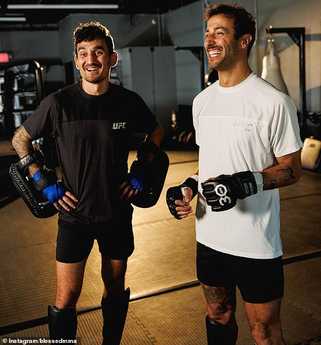 Concerned fans feared Daniel Ricciardo could potentially re-injure his hand after training with former UFC identity Max Holloway this week