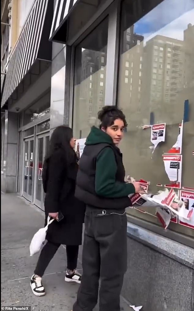 Sisters Aya and Dana were seen this week tearing up posters placed around Broadway and 79th Street on New York's Upper West Side