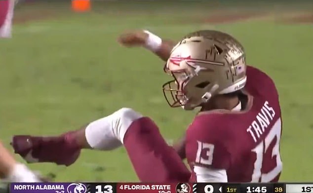 Florida State quarterback Jordan Travis was carted off the field after suffering a foot injury