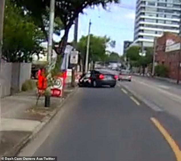 Dashcam footage captured the moment a gray Tesla picked up a white scooter in Footscray, Melbourne on Monday