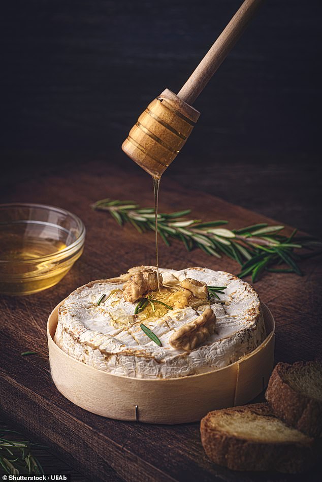 Camembert in its traditional round wooden box.  Critics have highlighted what they say would be the prohibitive cost of recycling these boxes, which they say is better for the environment than the plastic alternative.