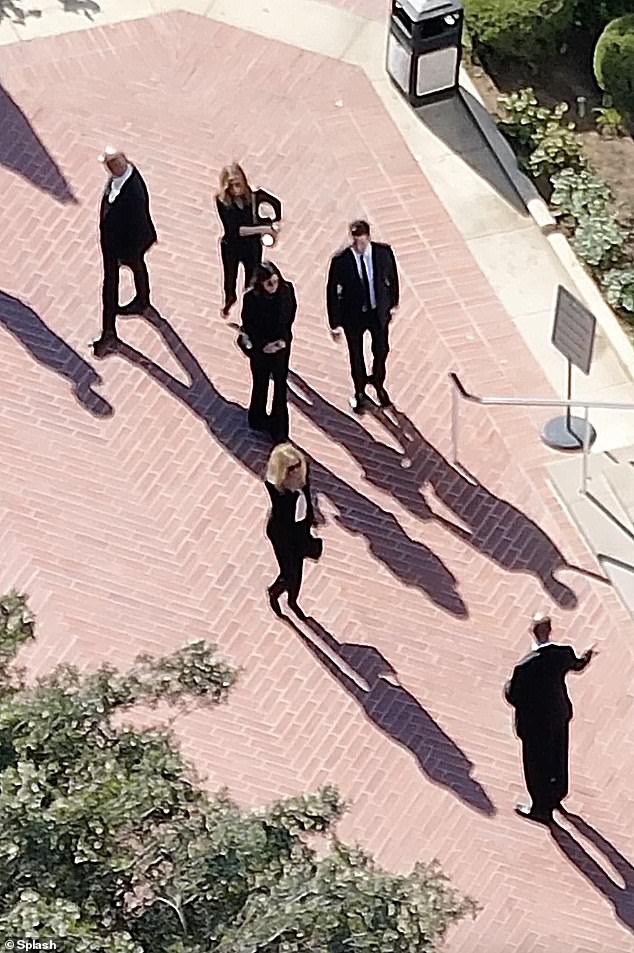 Jennifer Aniston (back), Courteney Cox and David Schwimmer (center) and Lisa Kudrow (front) are seen Friday at the Forest Lawn Church of the Hills, in Los Angeles