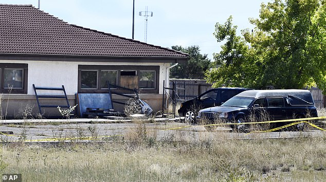 The owners of a defunct Colorado funeral home where 190 decomposing human bodies were found have returned to the state and are facing hundreds of charges.