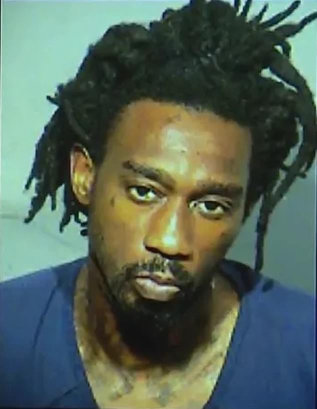 Disturbing bodycam footage shows Dannon Bryant (pictured) stabbing himself to the ground after fleeing the burning building where he recently stabbed a woman to death