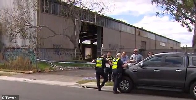 A man in his 30s was rushed from an abandoned factory in Springvale (above) to hospital after an alleged shooting