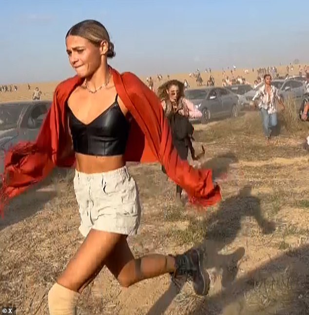 Pictured: Civilians fleeing the terror attack near Kibbutz Urim in southern Israel on October 7