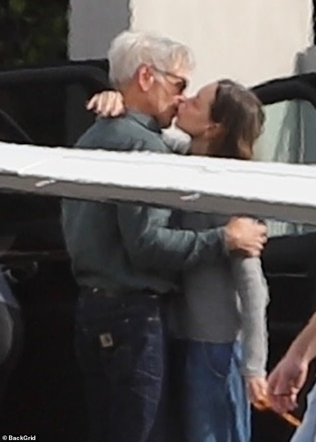 PDA warning!  Harrison Ford passionately kissed his third wife Calista Flockhart after landing safely on one of their 10 private planes in Los Angeles on Sunday following their family's Thanksgiving getaway to Montana