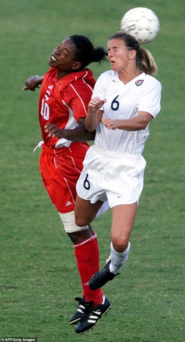 American Brandi Chastain (pictured right) and Canada's Charmaine Hooper (pictured left) headed the ball on July 1, 2000, during their semifinal match in the Women's Gold Cup Tournament in Louisville, Kentucky