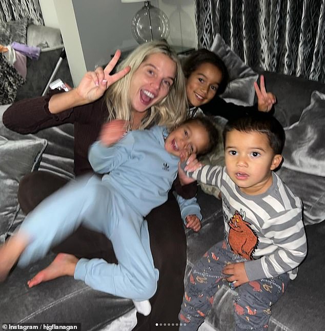 Unscathed: Her latest pictures come shortly after she walked away shocked but unscathed after crashing her £70,000 Audi earlier this month (pictured with her children)