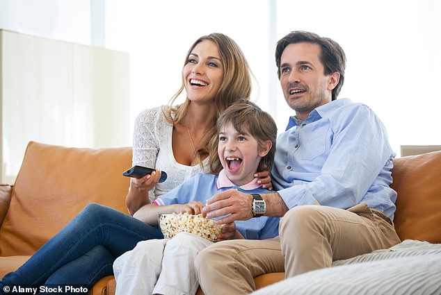Children who watched television with a parent had better literacy compared to those who watched screens alone, the study suggested (Stock Image)