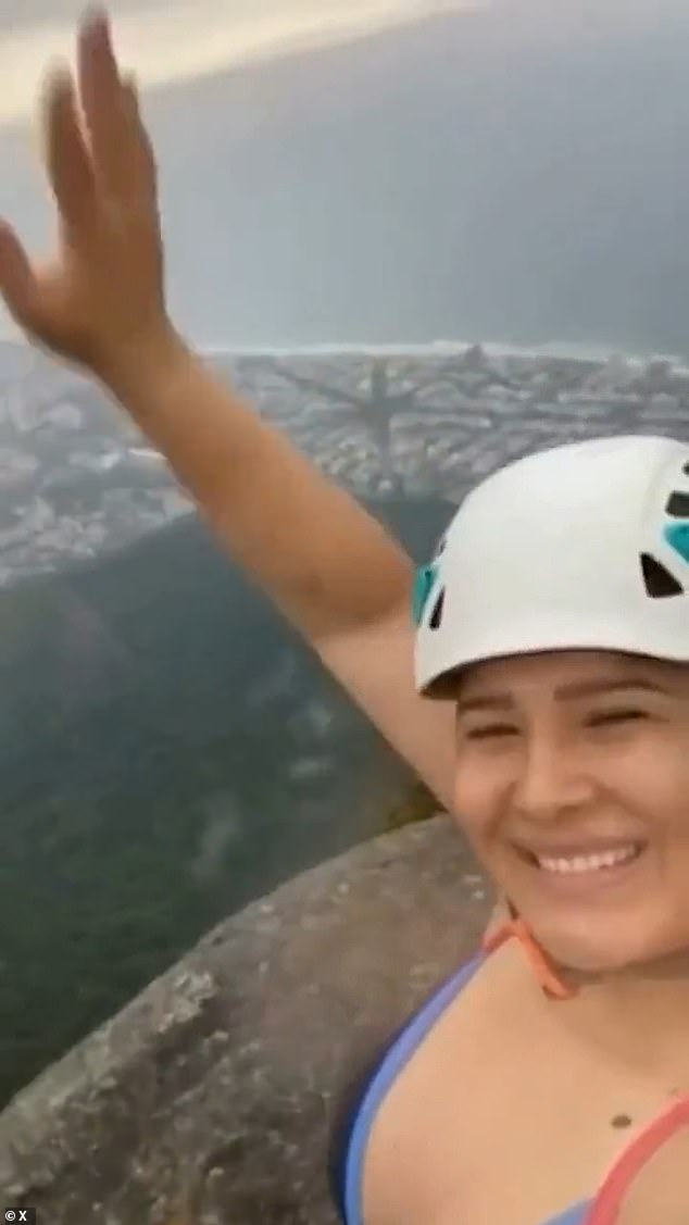 Karlla Araújo (pictured) was recording a video selfie showing her guide Leilson de Souza alone on a rock, moments before he was struck by lightning and killed