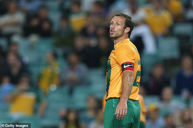 Neill (pictured playing for the Socceroos in 2013) was once one of the most recognizable faces in Australian football