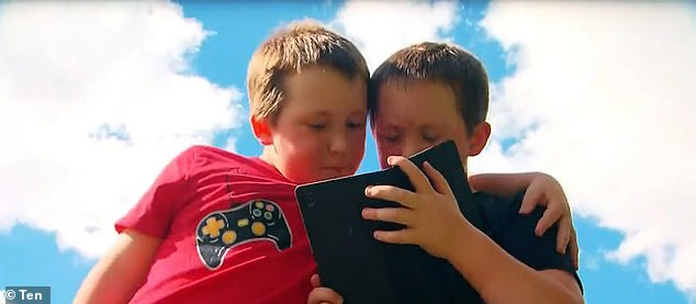 Jennifer Watkins was accused of posting child pornography to her YouTube account after a prank by one of her seven-year-old twin boys, Benjamin and Flynn (pictured), went terribly wrong