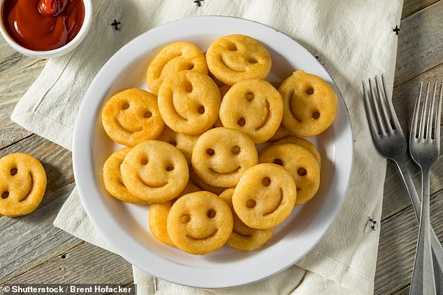 The surprising secret to getting your kids to eat more vegetables is to offer them potato smiles, according to scientists (stock image)