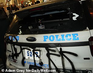 'IDF KKK' was spray-painted on the back of the police vehicle