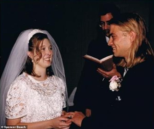 Spencer thought of his wife Tina and their unborn baby as he fought for survival after the fire (pictured: the couple on their wedding day)