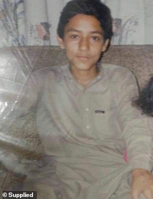 Pictured at age nine in Pakistan