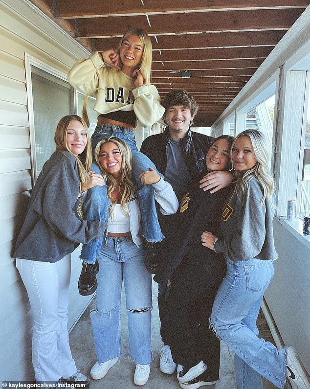 Mortensen, far left, is seen with her roommates: Kaylee Goncalves, Madison Mogen (on Kaylee's shoulders) Ethan Chapin, Xana Kernodle and Bethany Funke