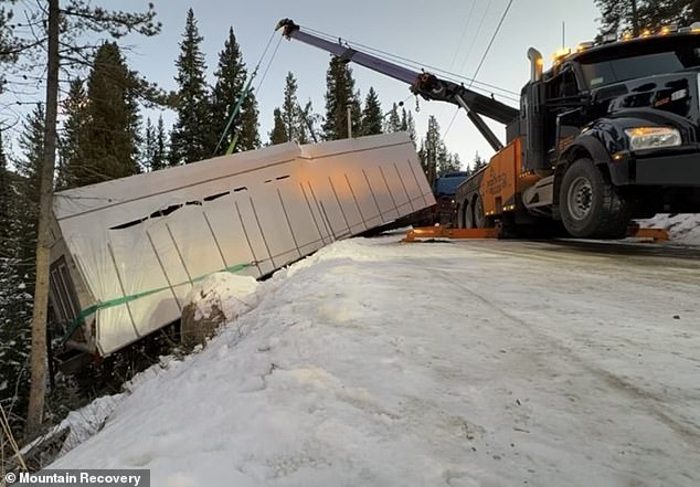 The 13-foot-tall modular home slid over a steep cliff in the Colorado Rocky Mountains on Nov. 21 — and towing workers tasked with bringing it back to safety feared the property would crumble like a 