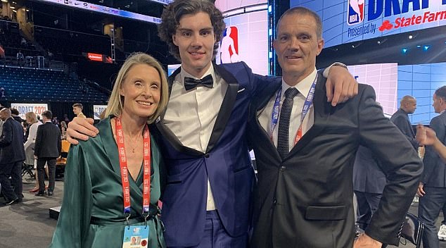 Josh Giddey is pictured with his parents Kim and Warrick